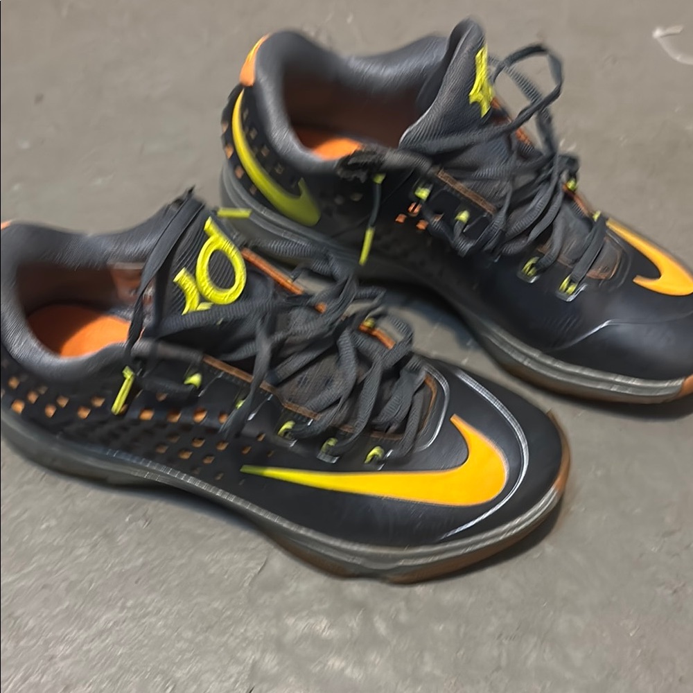 Nike Black and Orange Athletic Shoes with Rugged Sole